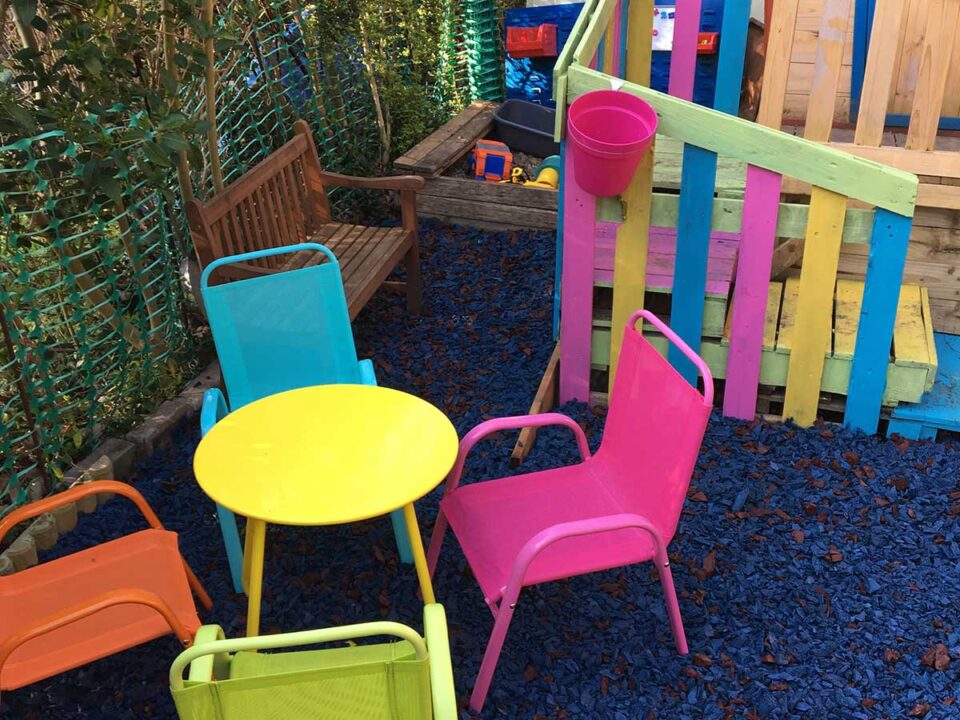 colourful playhouse with eco play rubber chippings