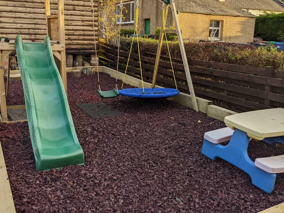 Garden play area with Eco-Play recycled chippings