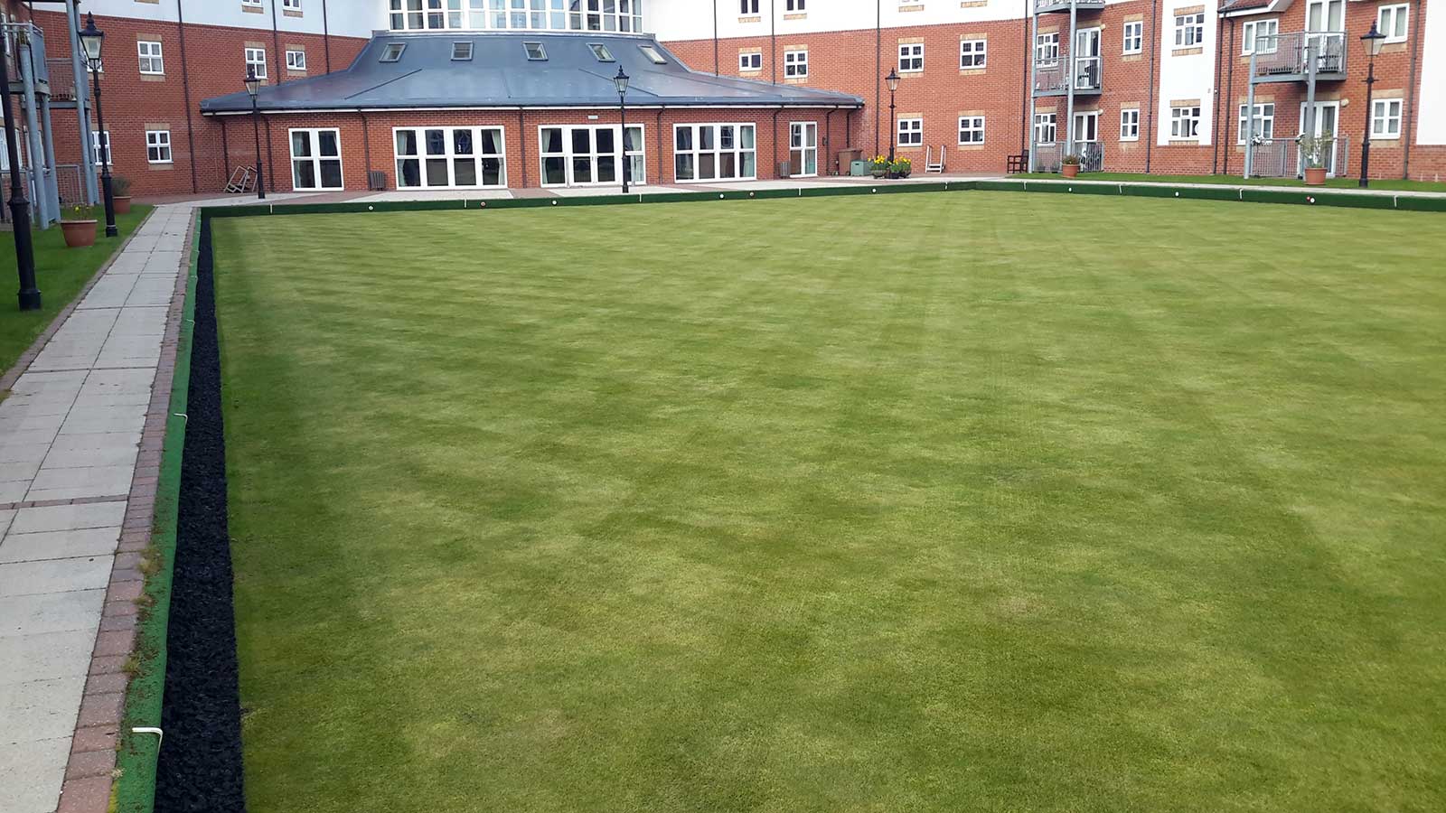 Rubber chippings in housing courtyard