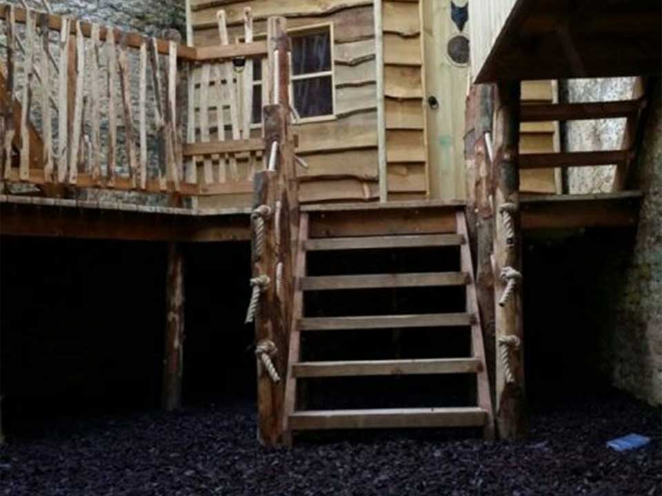 Treehouse with rubber chippings